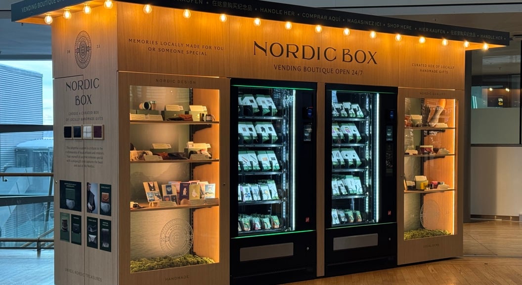 Nordic Box vending boutique with illuminated shelves and vending machines showcasing locally handmade gifts, located in a modern indoor setting