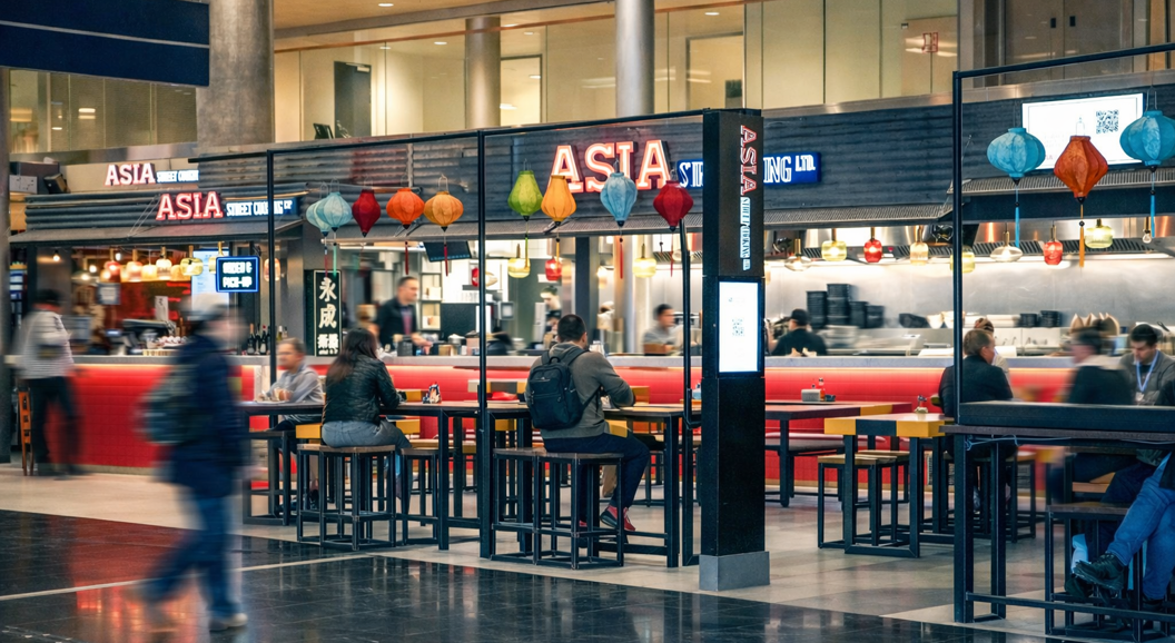 Street art mural featuring a woman in traditional Japanese attire holding ramen, alongside vibrant abstract patterns and Kanji characters. Asian cultural theme with rich colors and intricate details